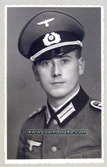 original photograph of a handsome Nazi soldier in his best uniform with a beautifully styled Schirmmütze or visor cap