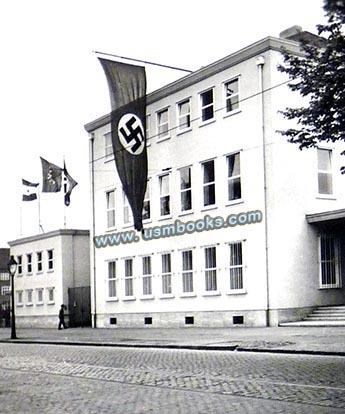 Nazi factory decorated with swastika banners