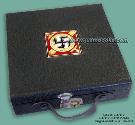custom-made case containing an original tile from Hitler's Reichschancellery in Berlin